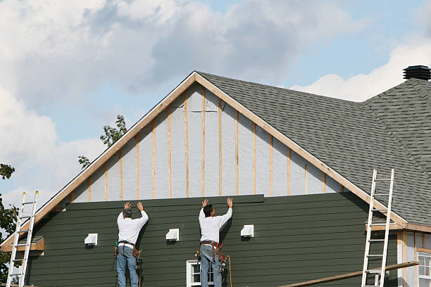 Professional Siding technician working in Amherst, TX